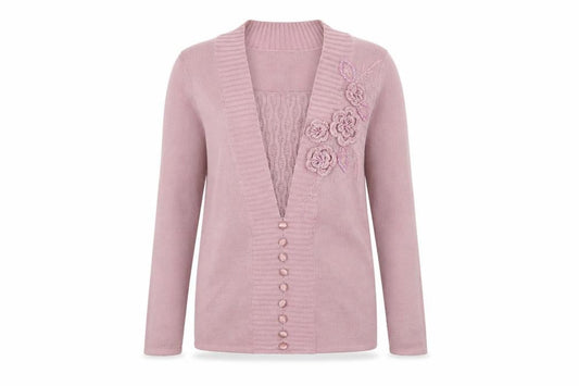 Front view of Damart women’s pink knit jumper, size UK 8, - flower detail
