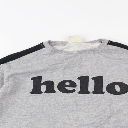 Close-up detail of Zara girls’ grey jumper, size 8, years