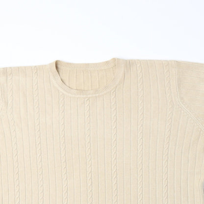Close-up detail of Preworn women’s beige knit jumper, size M