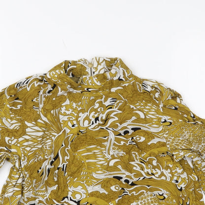 Close-up detail of H&M women’s yellow floral basic blouse, size UK 6