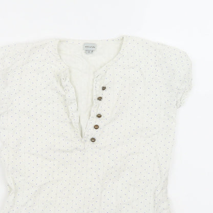 Close-up detail of MINI A TURE women’s white polka dot basic blouse, size UK 8