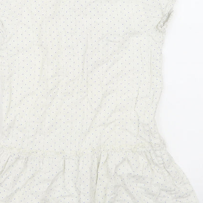 Brand and care label for MINI A TURE women’s white polka dot basic blouse, size UK 8