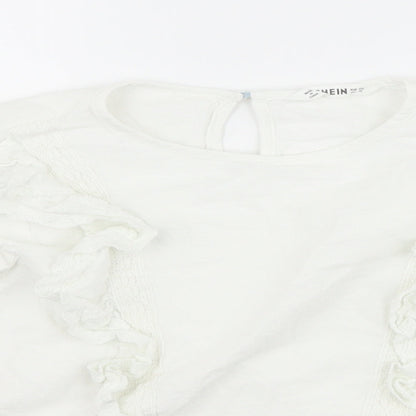 Close-up detail of SHEIN girls’ white basic blouse, size 7-8, years