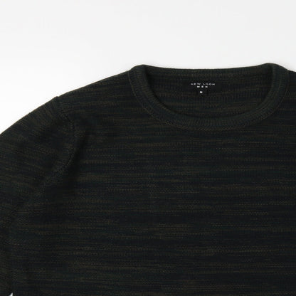 Close-up detail of New Look men’s green knit jumper, size M