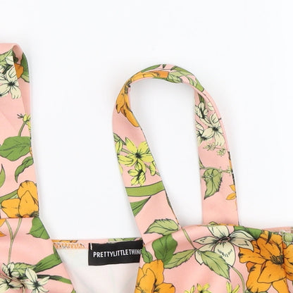Close-up detail of PRETTYLITTLETHING women’s pink floral basic tank, size UK 10