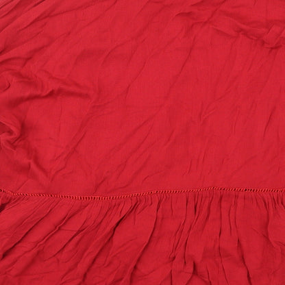 Brand and care label for ARTLOVE Paris women’s red basic blouse, size L