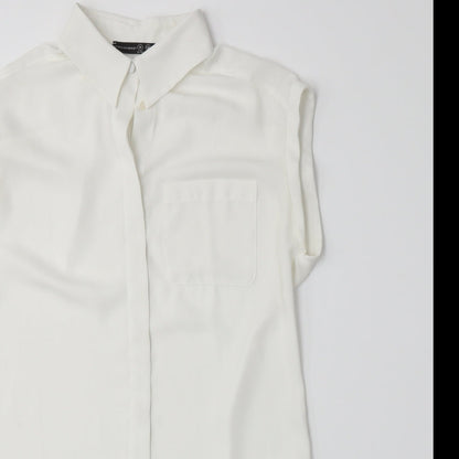 Close-up detail of Atmosphere women’s white basic button-up, size UK 8