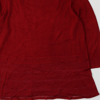 Brand and care label for Per Una women’s red jumper, size UK 16