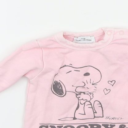 Close-up detail of Marc Jacobs girls’ pink jersey jumper, size 0-3, months - snoopy