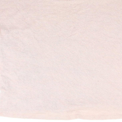 Brand and care label for Dorothy Perkins women’s pink floral jumper, size UK 10