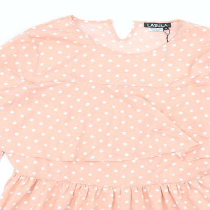 Close-up detail of Lasula women’s pink polka dot rayon a-line, size UK 14