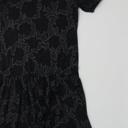 Brand and care label for Topshop women’s grey floral jersey a-line, size UK 6
