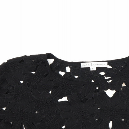 Close-up detail of Rare 2 London women’s black basic blouse, size M