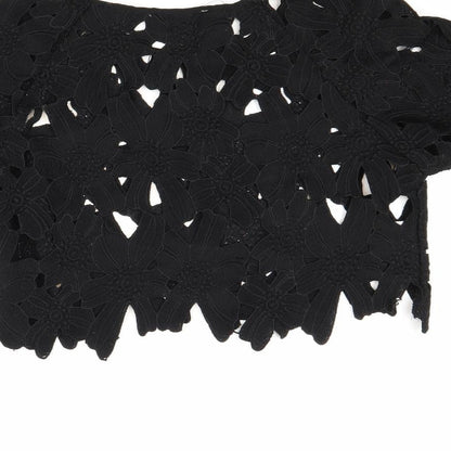 Brand and care label for Rare 2 London women’s black basic blouse, size M
