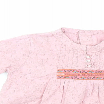 Close-up detail of Mothercare girls’ pink basic blouse, size 9-12, months