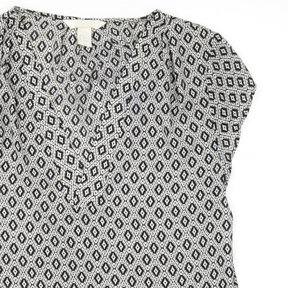 Close-up detail of H&M women’s black basic t-shirt, size UK 8