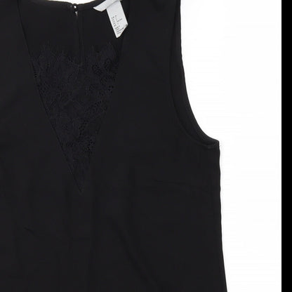 Close-up detail of H&M women’s black basic t-shirt, size UK 4