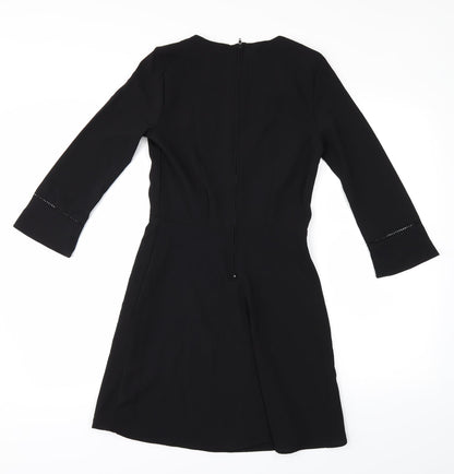 Back view of women’s black a-line, size UK 8
