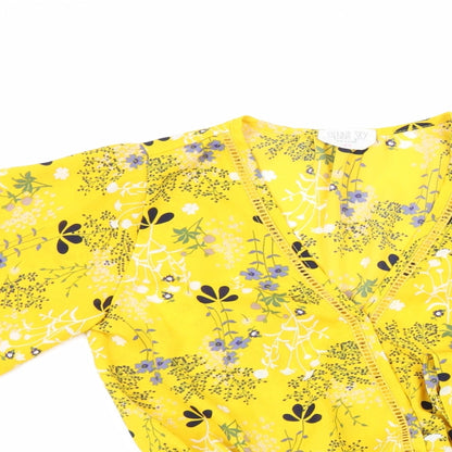 Close-up detail of Sienna Sky women’s yellow floral basic blouse, size XS