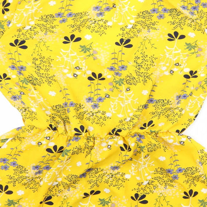 Brand and care label for Sienna Sky women’s yellow floral basic blouse, size XS