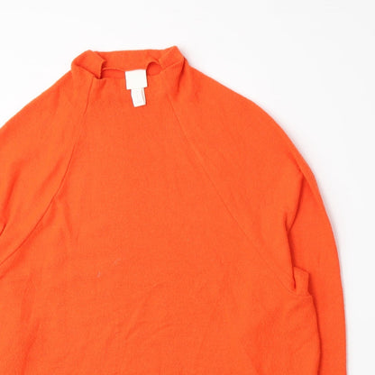Close-up detail of H&M women’s orange jumper, size S