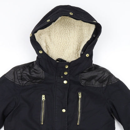 Close-up detail of Topshop women’s black parka coat, size UK 8