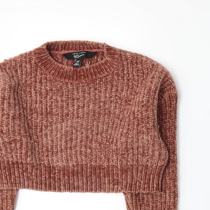 Close-up detail of New Look girls’ orange knit jumper, size 9, years