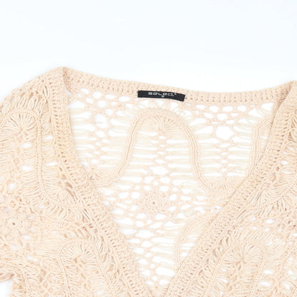 Close-up detail of Select women’s orange cardigan jumper, size S