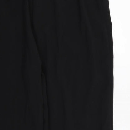Brand and care label for Essentials Collection women’s black rayon trousers, size UK 22, 27-inch leg