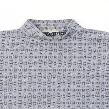 Close-up detail of Nutmeg women’s blue basic t-shirt, size UK 10