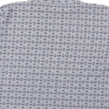 Brand and care label for Nutmeg women’s blue basic t-shirt, size UK 10