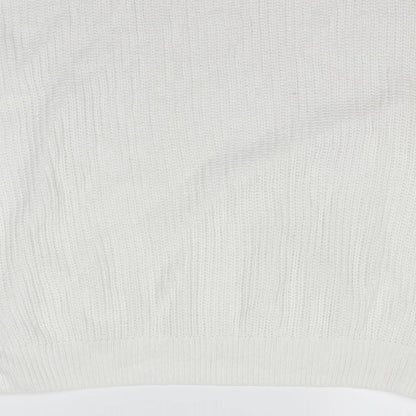 Brand and care label for Marks & Spencer women’s ivory jumper, size M