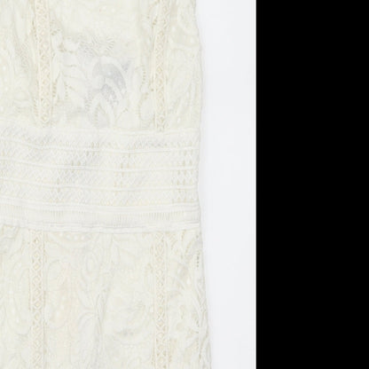 Close-up detail of Topshop women’s white lace mini, size UK 6