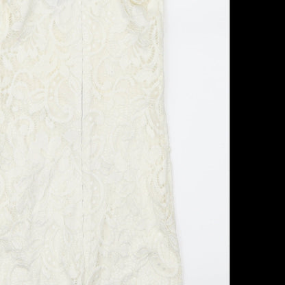 Brand and care label for Topshop women’s white lace mini, size UK 6