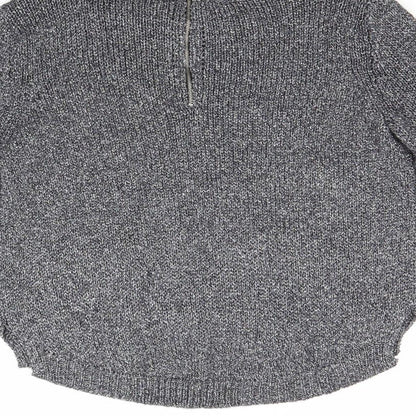 Brand and care label for H&M women’s silver jumper, size UK 10