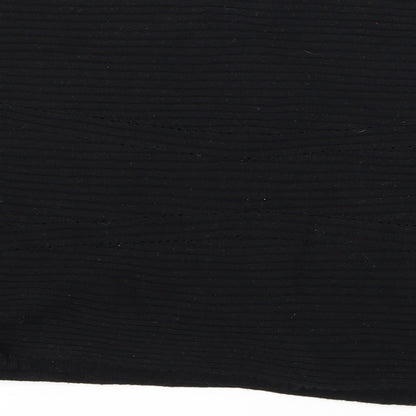 Brand and care label for KappAhl women’s black knit jumper, size M