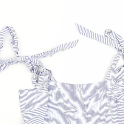 Close-up detail of H&M women’s blue striped basic blouse, size UK 8