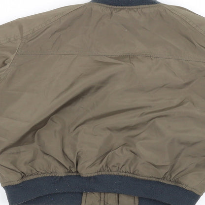 Brand and care label for Next girls’ brown jacket coat, size 3-4, years
