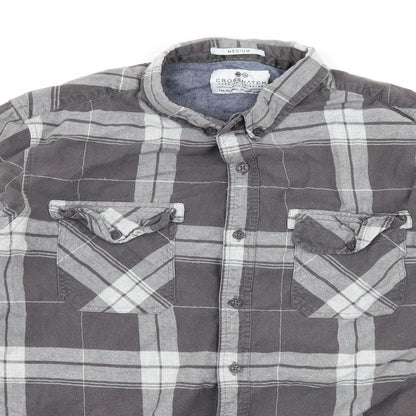 Close-up detail of Crosshatch men’s green plaid button-up, size M