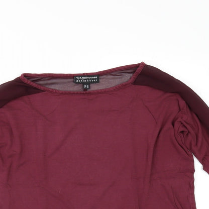 Close-up detail of Warehouse women’s red basic polo, size UK 12