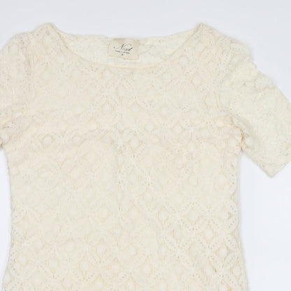 Close-up detail of Next women’s ivory shift, size UK 8