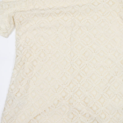 Brand and care label for Next women’s ivory shift, size UK 8