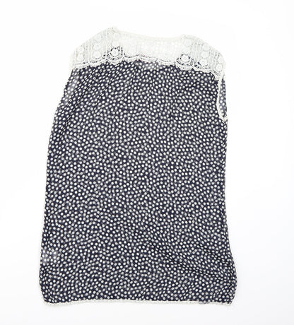 Back view of Be Beau women’s black polka dot basic blouse, size UK 12