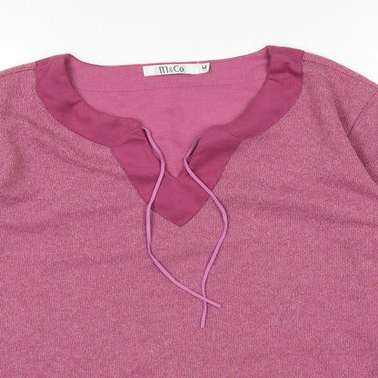 Close-up detail of M&Co women’s pink jumper, size M