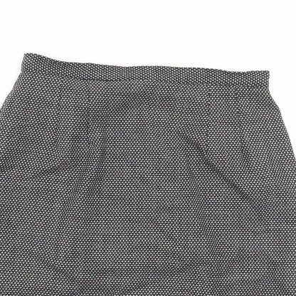 Close-up detail of Gianni women’s black geometric a-line skirt, size UK 6