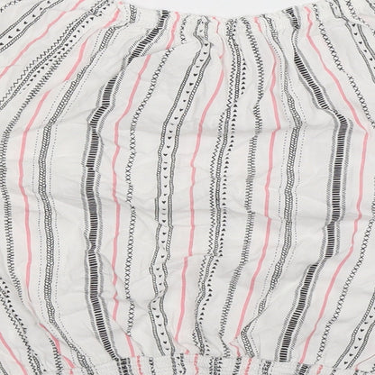 Brand and care label for H&M girls’ white striped basic blouse, size 14, years