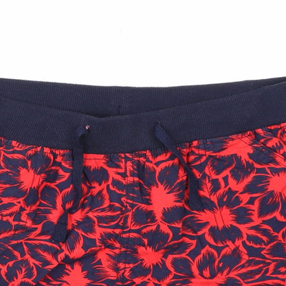 Close-up detail of Atmosphere women’s blue floral sweat shorts, size UK 8