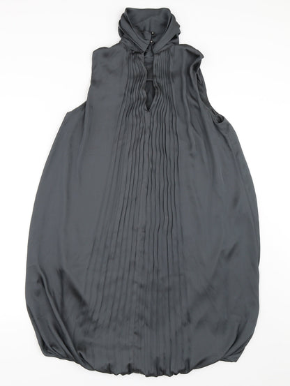 Back view of women’s green satin shift, size M