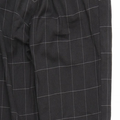 Brand and care label for Weekday men’s grey check trousers, 29-inch leg