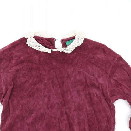 Close-up detail of C&A women’s red jumper, size UK 14